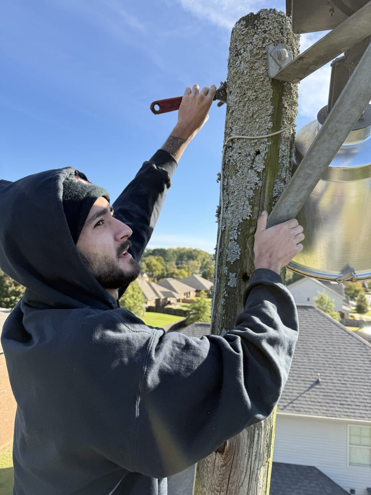 Spark Medic electrician working on an outdoor electrical project in North Alabama